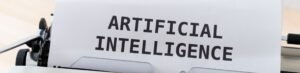 A close-up of a typewriter showcasing 'ARTIFICIAL INTELLIGENCE' on paper.